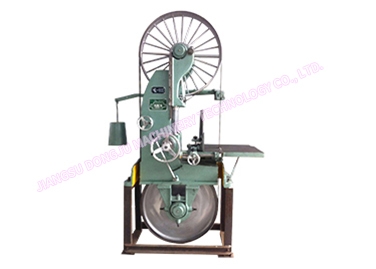 What is the function of the saw card of the woodworking band saw machine?